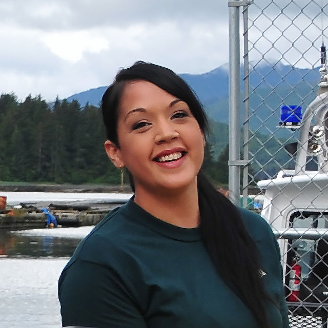 Headshot photo of Camille Collinson in a Parks Canada uniform.