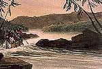 A canoe enters the rapids